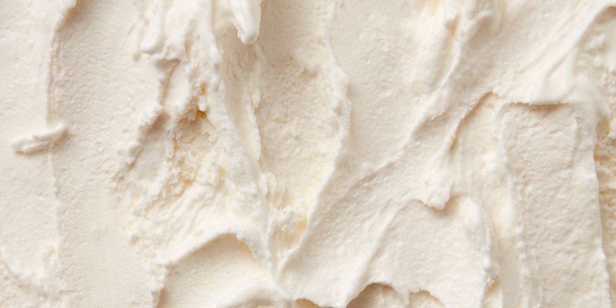 Close-up of smooth, whipped body butter with soft peaks